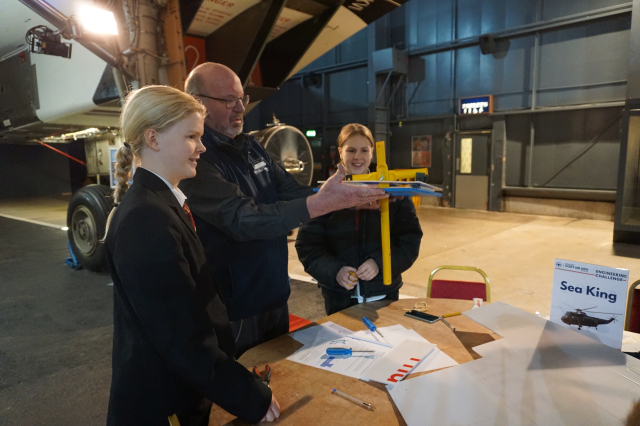 Students looking at a model