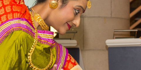 Female dancer in traditional Hindu clothes